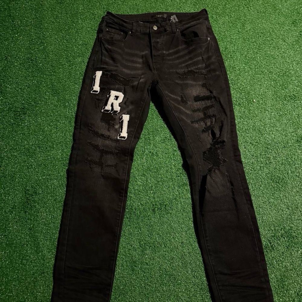 AMIRI Black Distressed Skinny Jeans